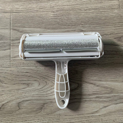 Dog roller sticking device
